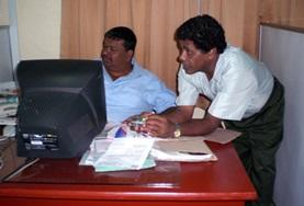 Volunteer Business Two employees in the marketing sector of a Sri Lankan business explain their roles to an intern.