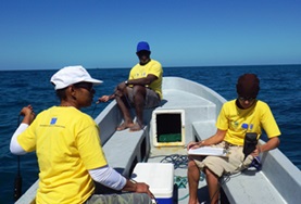 Volunteer Conservation & Environment Conservation volunteers pictured on a boat during a marine expedition in Belize