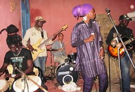 Volunteer Senegal A local band in Senegal plays a set on stage at our volunteer Music & Culture placement.