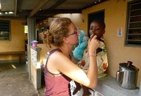 Volunteer Togo A dentistry student doing her elective in Togo examines a local child's teeth.