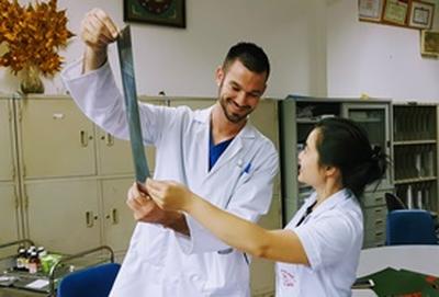 Volunteer Medical Electives A group of medicine students work towards their elective course credits by shadowing doctors at a hospital in Tanzania, Africa.