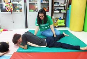 Volunteer Medical Electives An intern works on a therapy technique with a patient during her Physiotherapy Elective in Vietnam.
