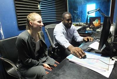 Volunteer Jamaica A Journalism intern works on a radio broadcast with a local radio DJ in Jamaica.