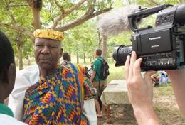 Volunteer Togo A Journalism intern conducts an interview with a man for a local news broadcasting company in Togo.