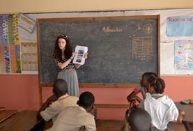Volunteer Law & Human Rights A Human Rights volunteers presents to a classroom