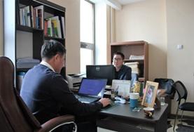 Volunteer Law & Human Rights Human Rights voluntees work at their desks at a placement in Mongolia