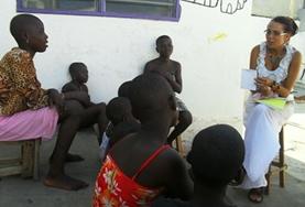 Volunteer Law & Human Rights A Human Rights volunteer speaks to local people in Togo about their rights during an awareness campaign.