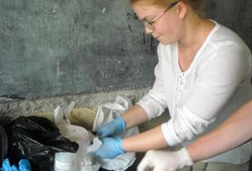 Volunteer Medicine & Healthcare A Midwifery intern assists with preparing medication for newborn babies at a hospital in Togo.