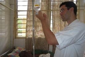 Volunteer Medicine & Healthcare A Nursing intern assists with the care and treatment of patients at a local hospital in Togo.