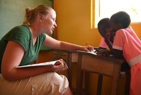 Volunteer Ghana A Speech Therapy intern works closely with two children at our volunteer placement in Ghana.