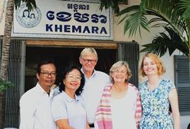 Volunteer Micro-finance Volunteers pose for a picture with local entrepreneurs on a Micro-finance Project in Cambodia