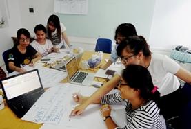 Volunteer Care A qualified Social Worker gives a workshop to Social Work volunteers at a childcare placement in Vietnam.