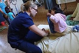 Volunteer Medicine & Healthcare A Physiotherapy volunteer works with a child during a session in Cochabamba, Bolivia