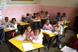 Volunteer Ethiopia A class of school children listens intently to the lesson given by a volunteer professional English Teacher in Ethiopia.
