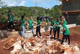 Volunteer Jamaica A group of Building volunteers works together to clear rocks from a building site in Jamaica over their Easter holiday.