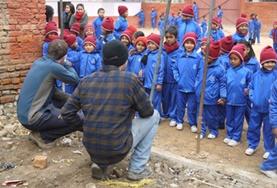 Volunteer Nepal High School Special volunteers begin laying the foundation for an earthquake-proof classroom being built in Nepal.