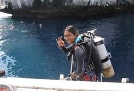 Volunteer Conservation & Environment A Conservation & Community volunteer prepares for a survey dive to monitor marine life off the coast of Thailand.