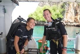 Volunteer Thailand Two High School Special volunteers prepare for a survey dive as part of their marine conservation work in Thailand.