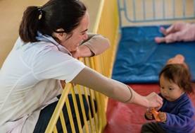 Volunteer Social Work A Social Work Intern interacts with a child in Bolivia