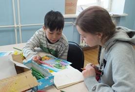 Volunteer Social Work A Social Work Intern interacts with a child in Mongolia