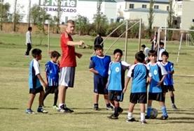 Volunteer Sports A Football volunteer speaks to his team on a sports placement in Bolivia