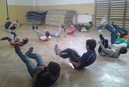 Volunteer Sports Children partake in exercises with their School Sports volunteer at a placement in Romania