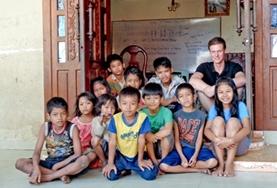 Volunteer Teaching A volunteer is pictured with children at a Teaching Project placement in Cambodia